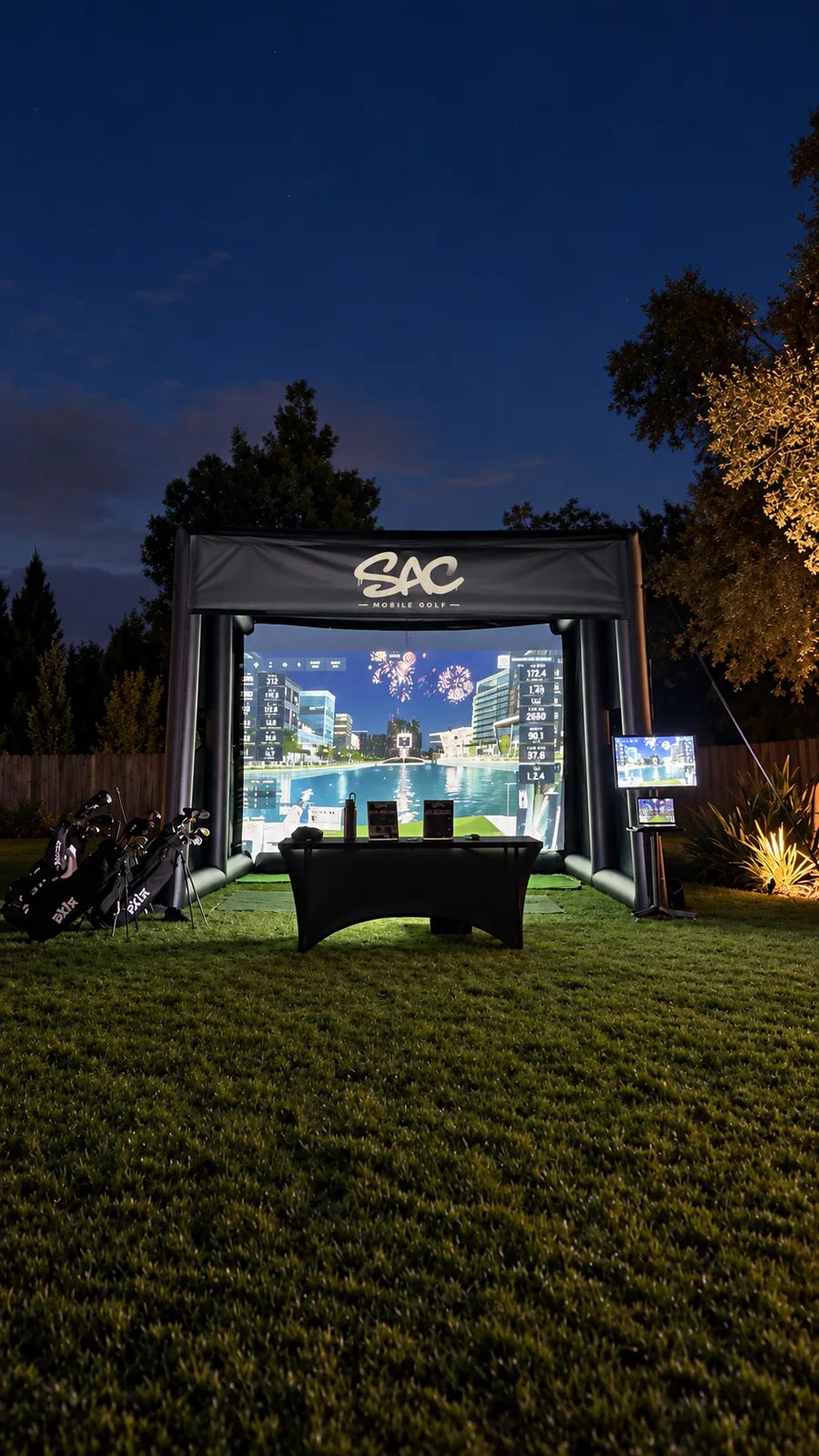 Sac Mobile Golf simulator illuminated for an evening event